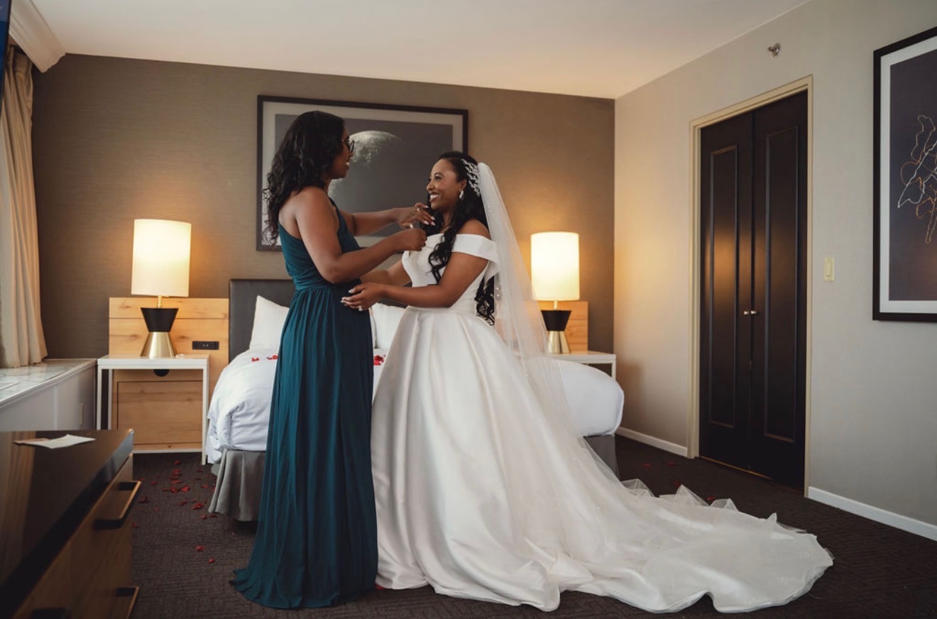 Wedding ceremony arch with flowers